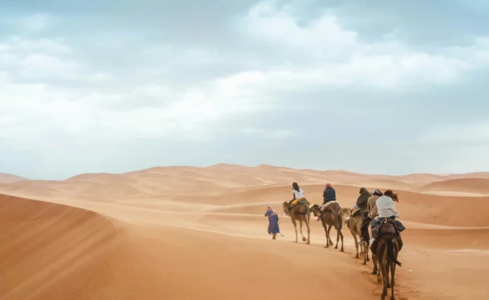 Travelers exploring the Sahara Desert and imperial cities on a 7 Day Morocco Tour Itinerary