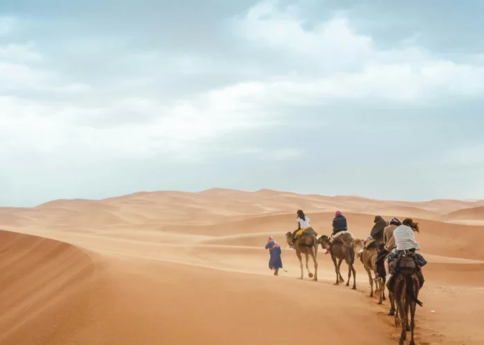 Travelers exploring the Sahara Desert and imperial cities on a 7 Day Morocco Tour Itinerary